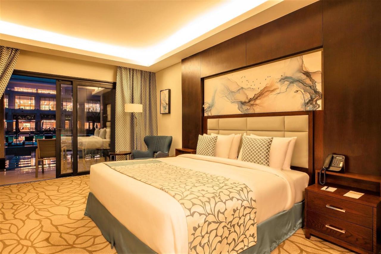 Triumph Luxury Hotel Kairo Bagian luar foto A bedroom at the hotel