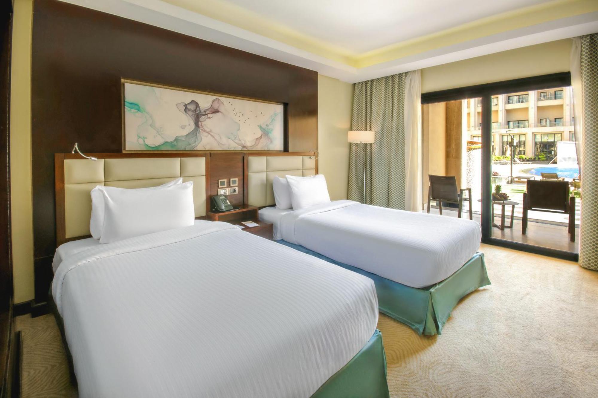 Triumph Luxury Hotel Kairo Ruang foto Deluxe Room