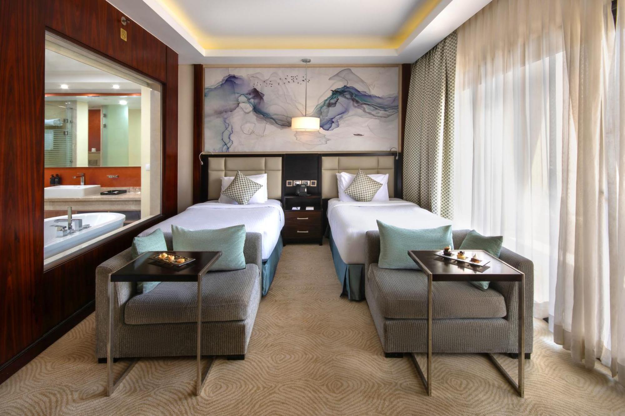 Triumph Luxury Hotel Kairo Ruang foto Deluxe Room