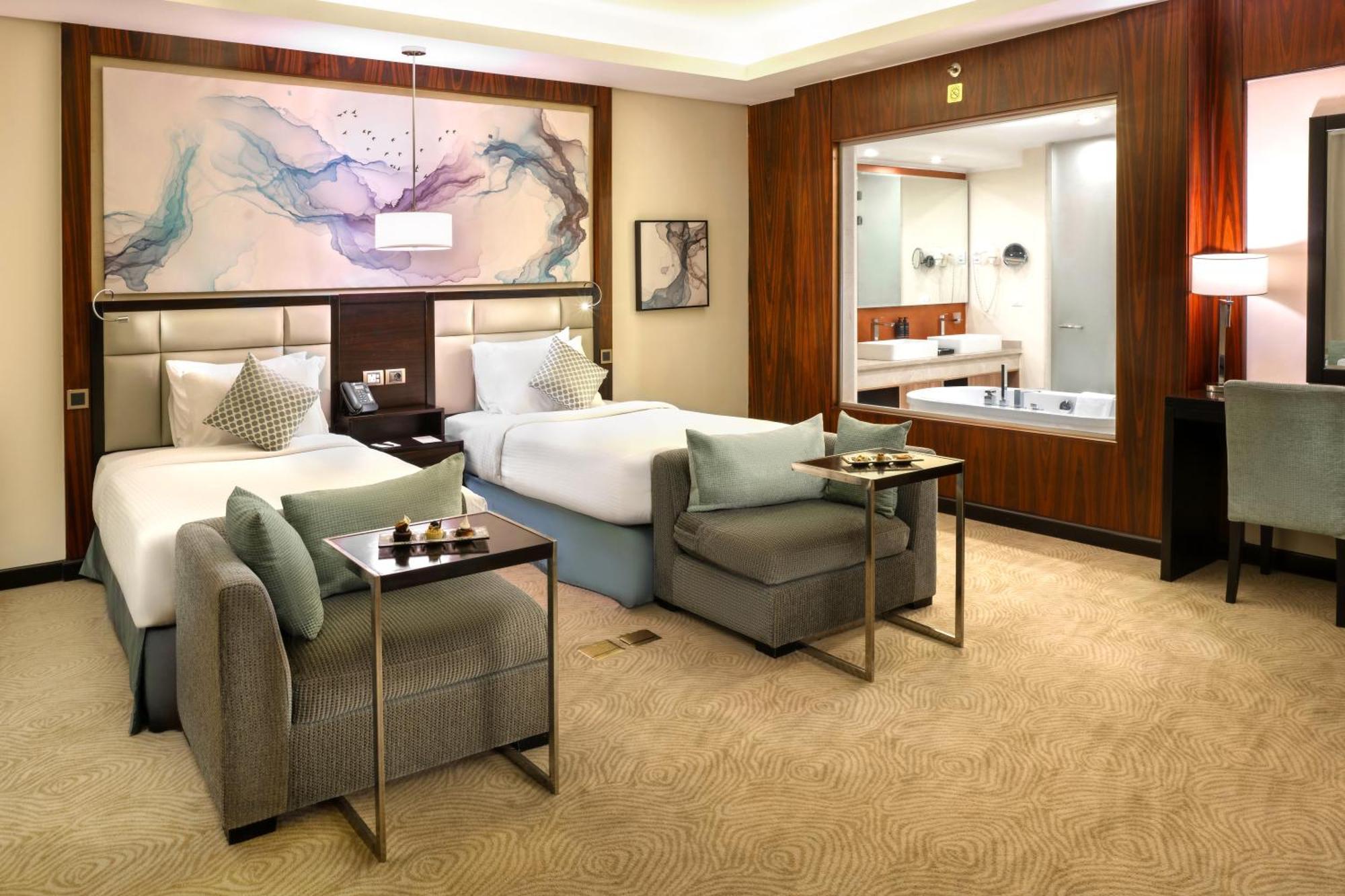 Triumph Luxury Hotel Kairo Ruang foto Deluxe Room