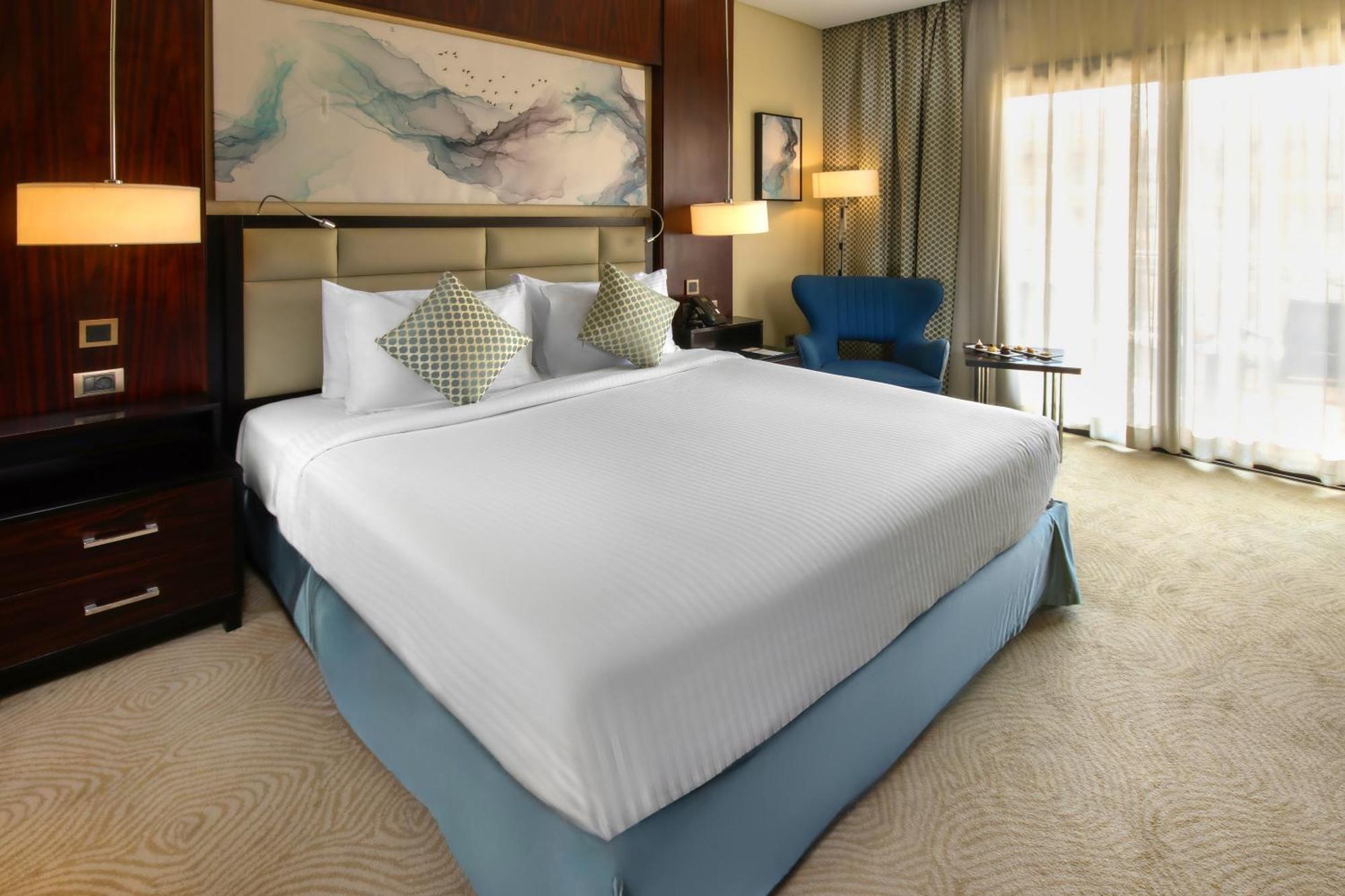 Triumph Luxury Hotel Kairo Ruang foto Deluxe Room